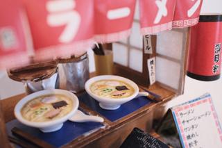 Close-up of the replica ramen bowls.