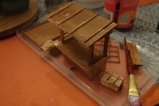 Wooden pieces dry after being stained brown.