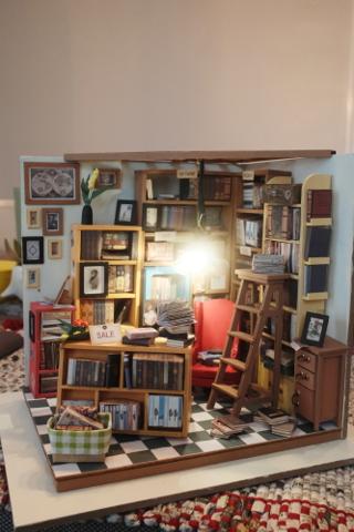 A fully-assembled miniature study, lit up.