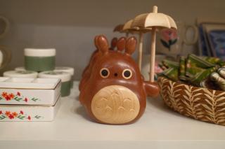 A carved Totoro character.
