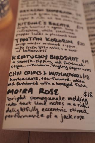 Bar menu printed on trifold paper.