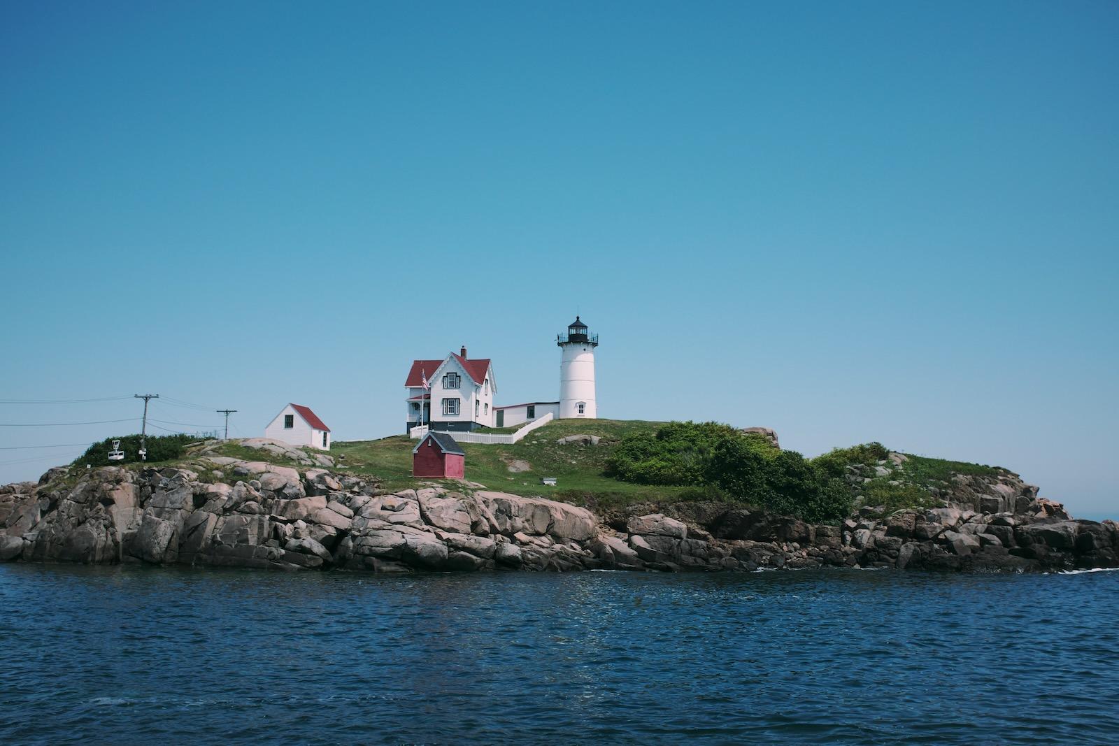 A small island with a lighthouse.