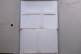 Cards and envelopes inside a folder