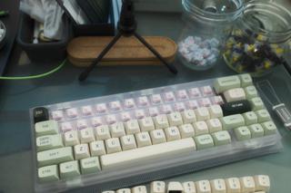 Keyboard with half of its keycaps installed.