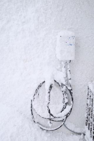 EV Charger covered in snow.