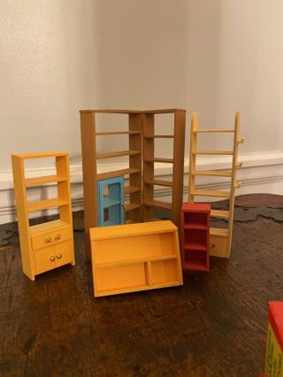 A collection of miniature bookshelves.